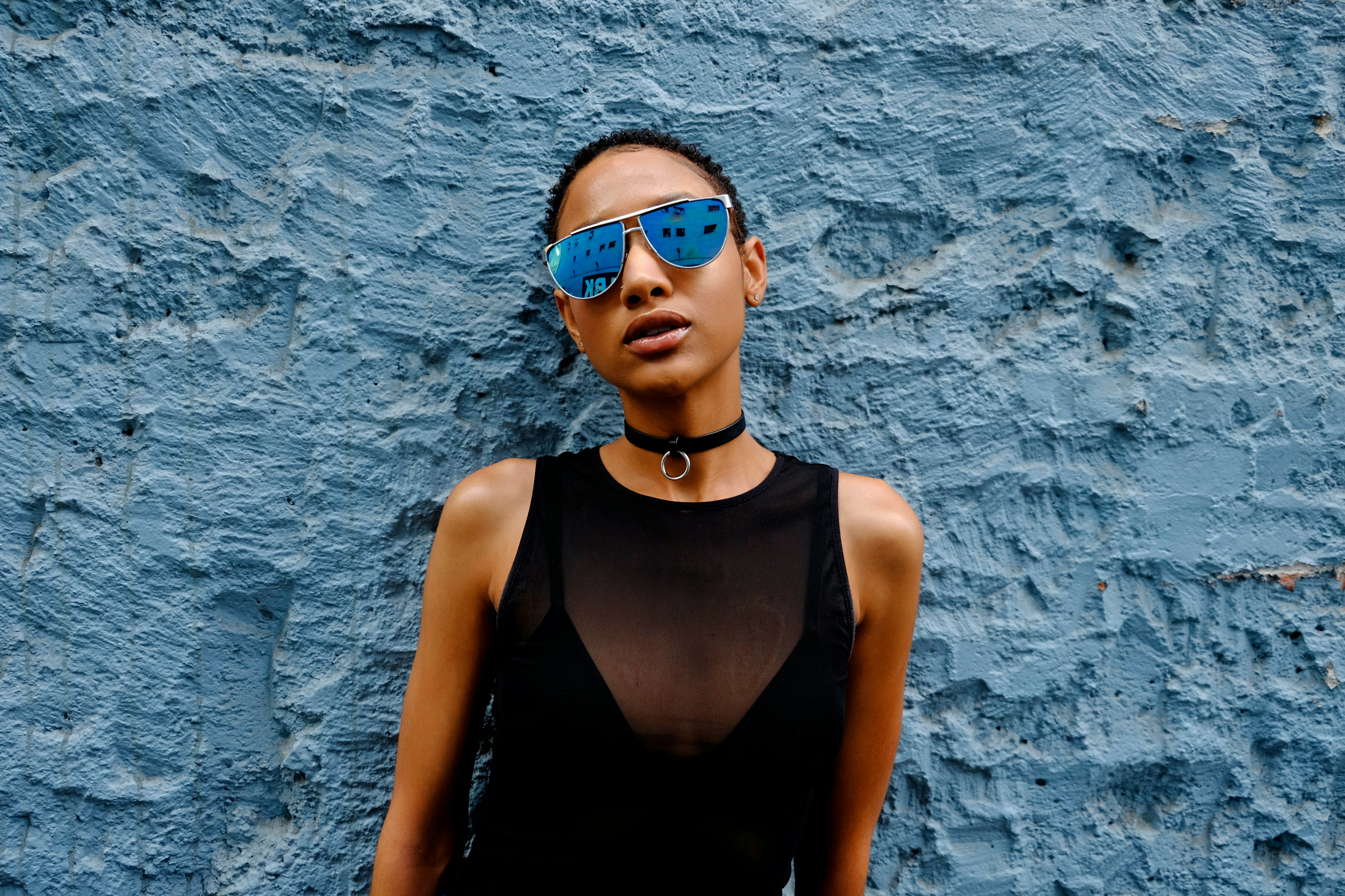 woman standing in front of wall